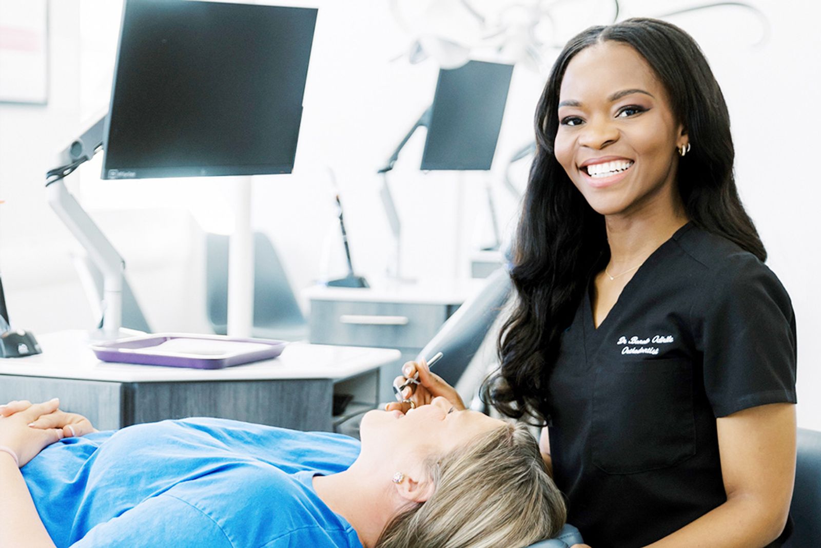 Dr. Bonolo caring for a patient at Refined Orthodontics