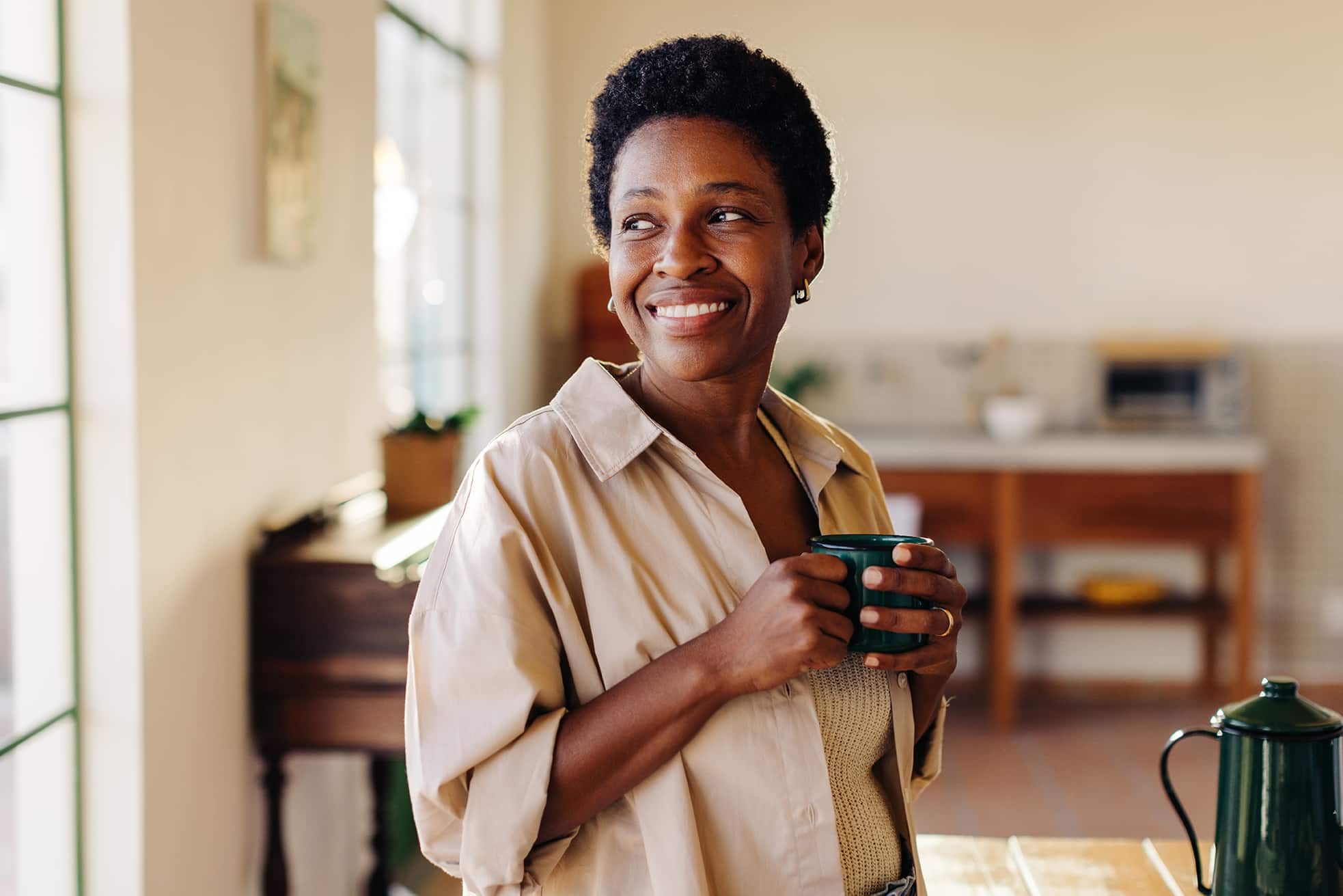 woman smiling after orthodontic treatment at refined orthodontics